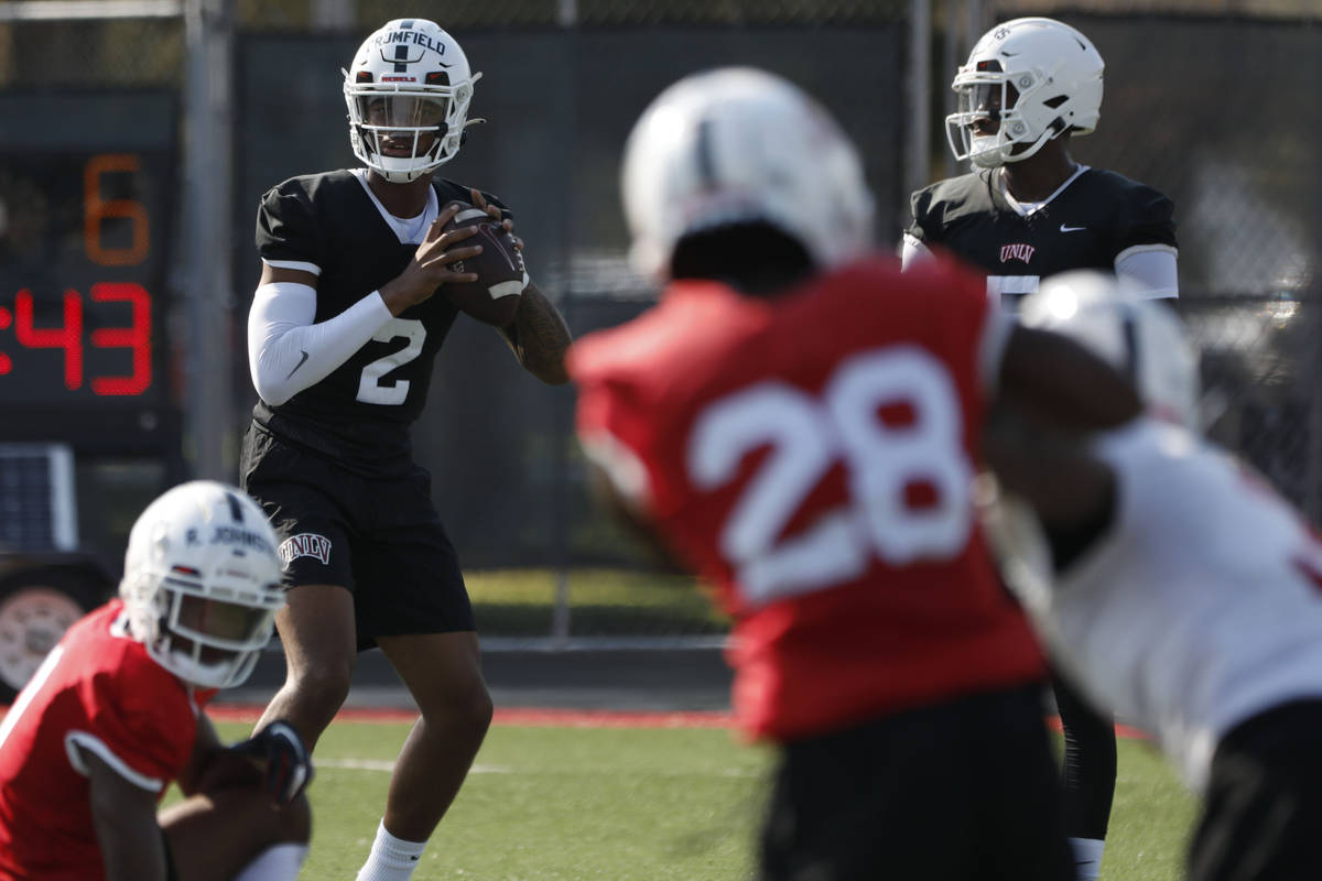 UNLV Rebels quarterback Doug Brumfield (2) looks to throw the ball during football practice in ...