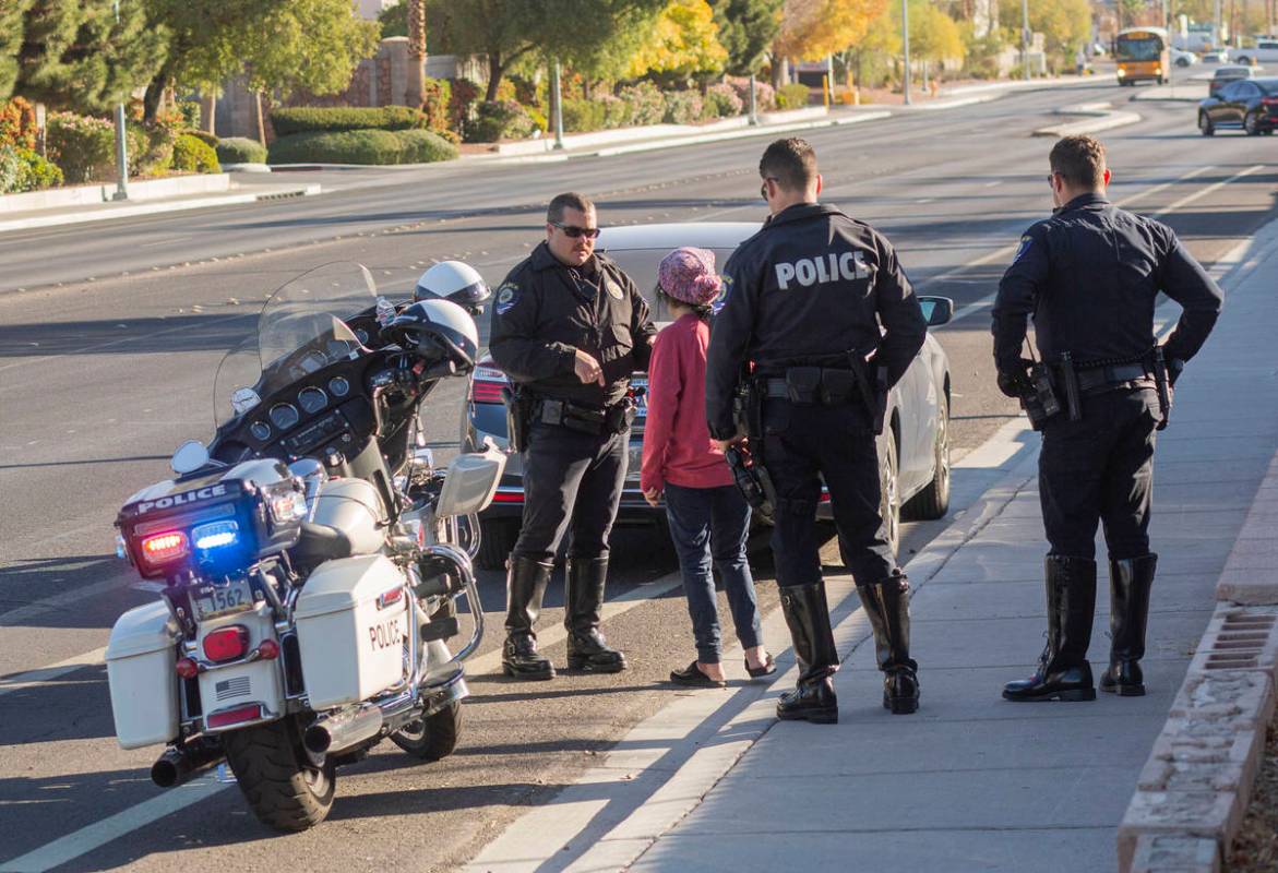 Officer Shane Barton of "Fab Five," the five-member traffic unit of Clark County School Distri ...