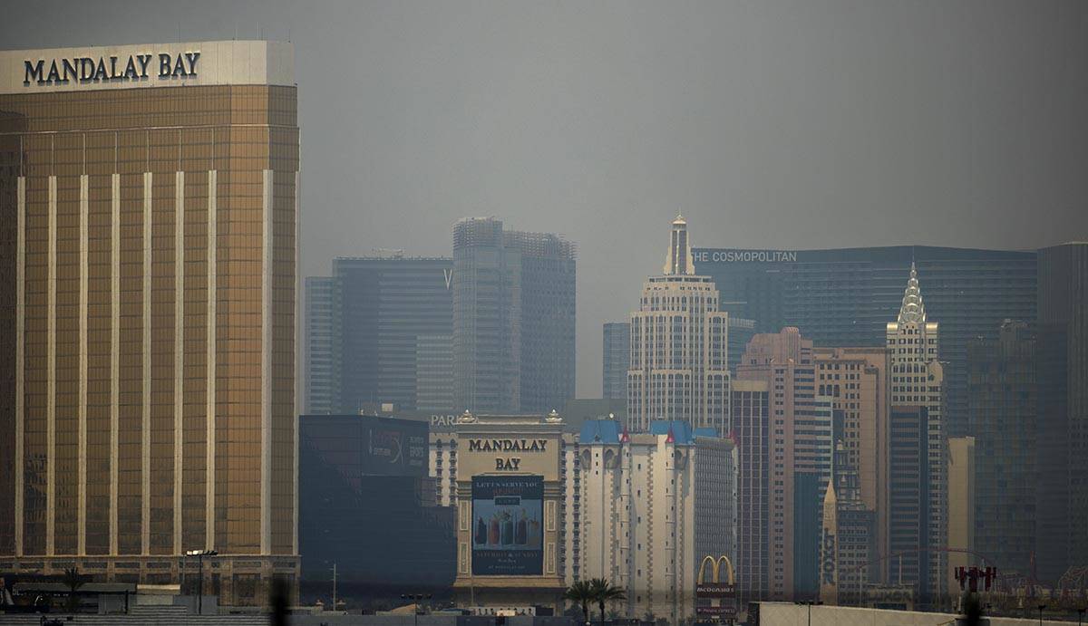 The Mandalay Bay and New York-New York with others covered by wildfire smoke drifting into the ...