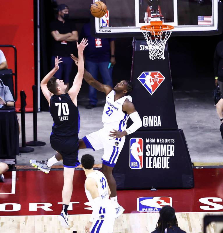 Orlando's Jon Teske (70) shoots over Golden State's Cameron Oliver (27) during the first half o ...