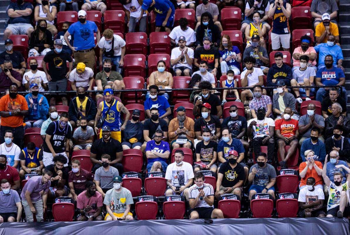 Basketball fans watch as Golden State plays Orlando during the first half of an NBA Summer Leag ...