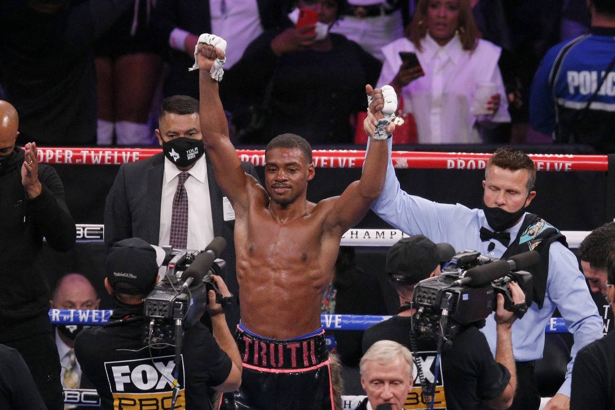 Errol Spence Jr. celebrates after defeating Danny Garcia by unanimous decision in the WBC-IBF w ...