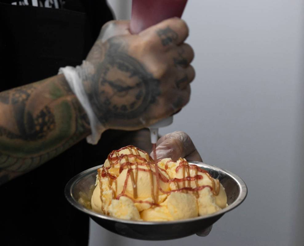 Marco Albanese, owner of Drill It Creamery, prepares peanut butter and jelly and strawberry jam ...