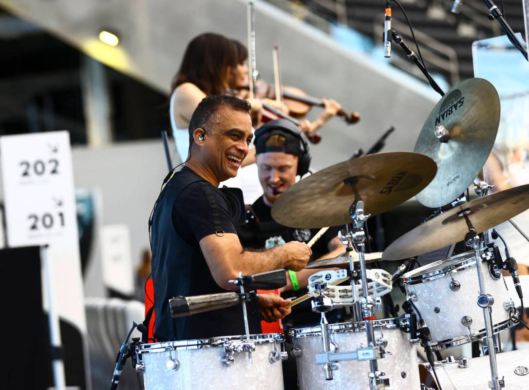 Members of David Perrico's Pop Strings band perform at Allegiant Stadium in Las Vegas on Monday ...