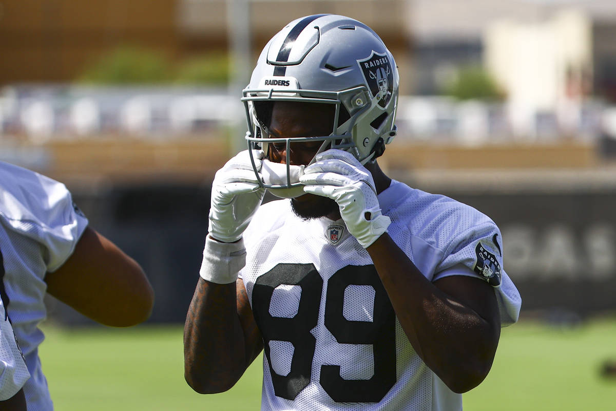 Raiders wide receiver Bryan Edwards (89) adjusts his helmet during NFL football practice at Rai ...