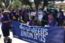 Members of the Service Employees International Union picket outside the Las Vegas Review-Journa ...