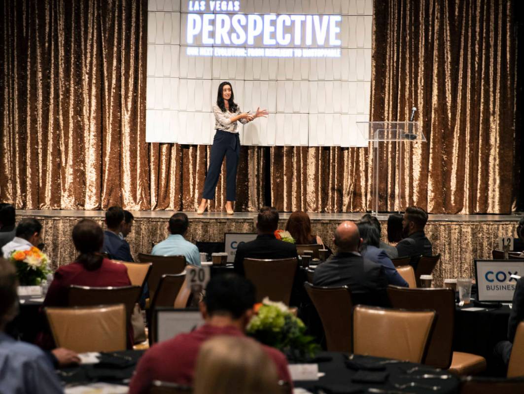 Attendees listen as Erica Orange, executive vice president and chief operating officer of The F ...