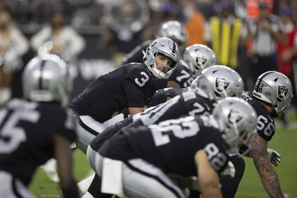 Raiders quarterback Nathan Peterman (3) runs the offense in the first quarter during an NFL pre ...