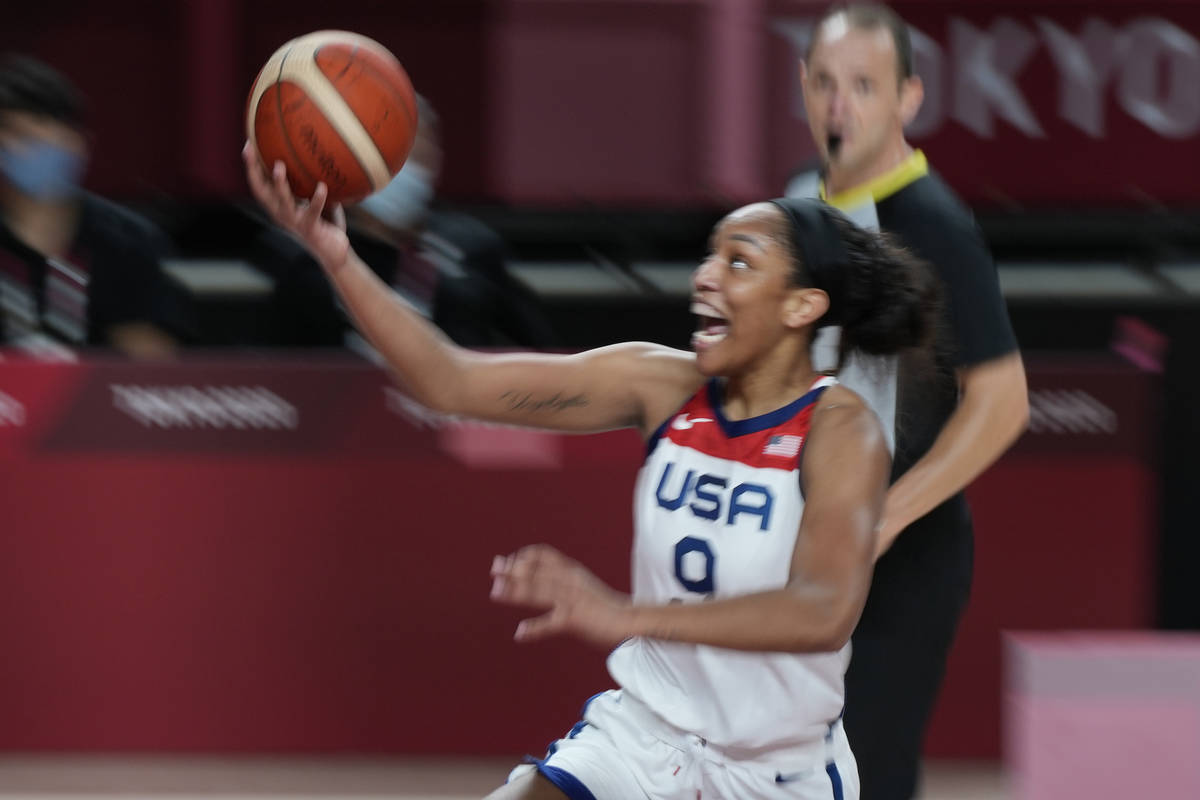 United States' A'Ja Wilson (9) drives to the basket during women's basketball gold medal game a ...