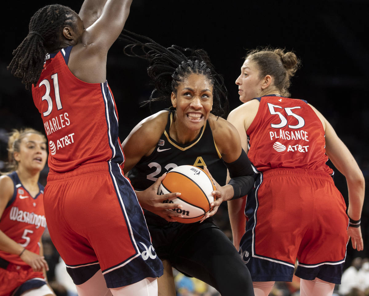 Las Vegas Aces forward A'ja Wilson (22) makes a move against Washington Mystics center Tina Cha ...