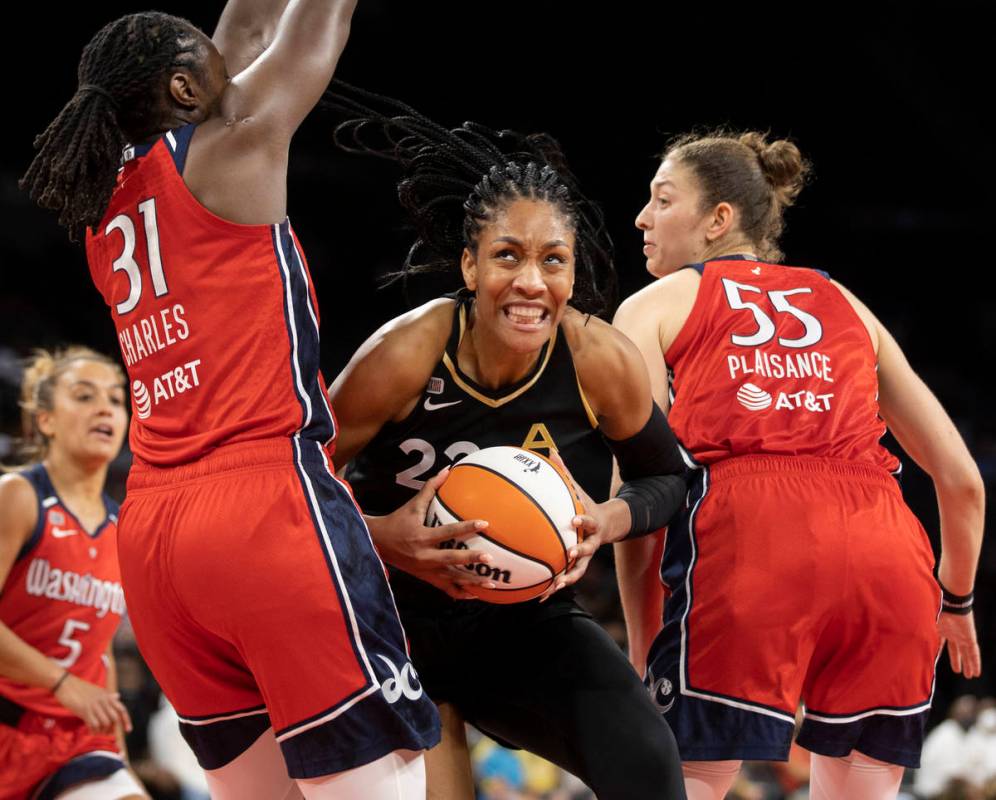 Las Vegas Aces forward A'ja Wilson (22) makes a move against Washington Mystics center Tina Cha ...