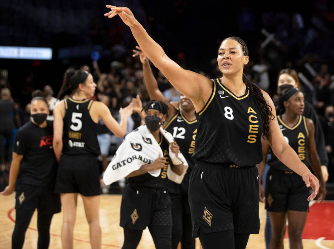 Las Vegas Aces center Liz Cambage (8) waves goodbye to Washington Mystic players after the Ace ...