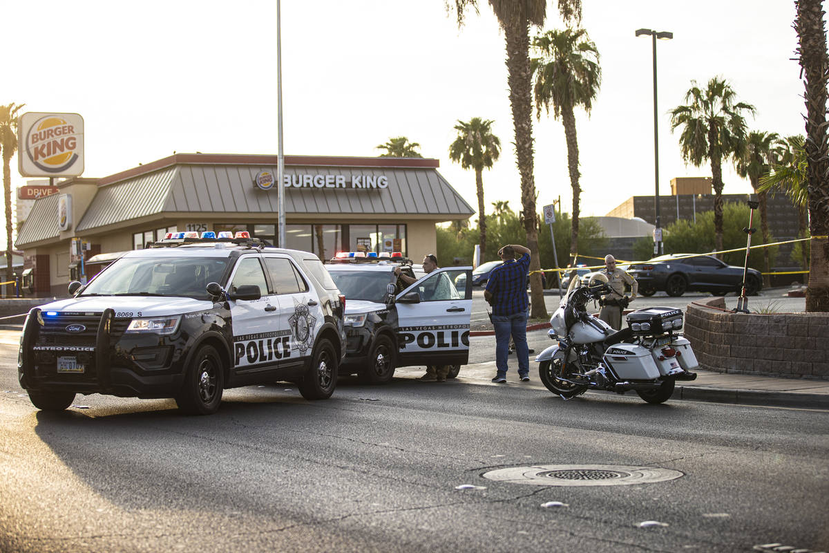 Las Vegas Metropolitan Police investigate a homicide at East Charleston Boulevard and South Mar ...