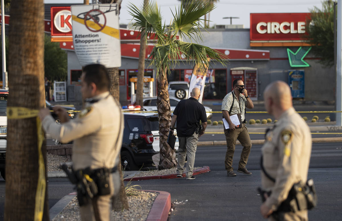 Las Vegas Metropolitan Police investigate a homicide at East Charleston Boulevard and South Mar ...