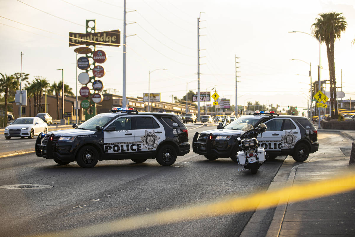 Las Vegas Metropolitan Police investigate a homicide at East Charleston Boulevard and South Mar ...