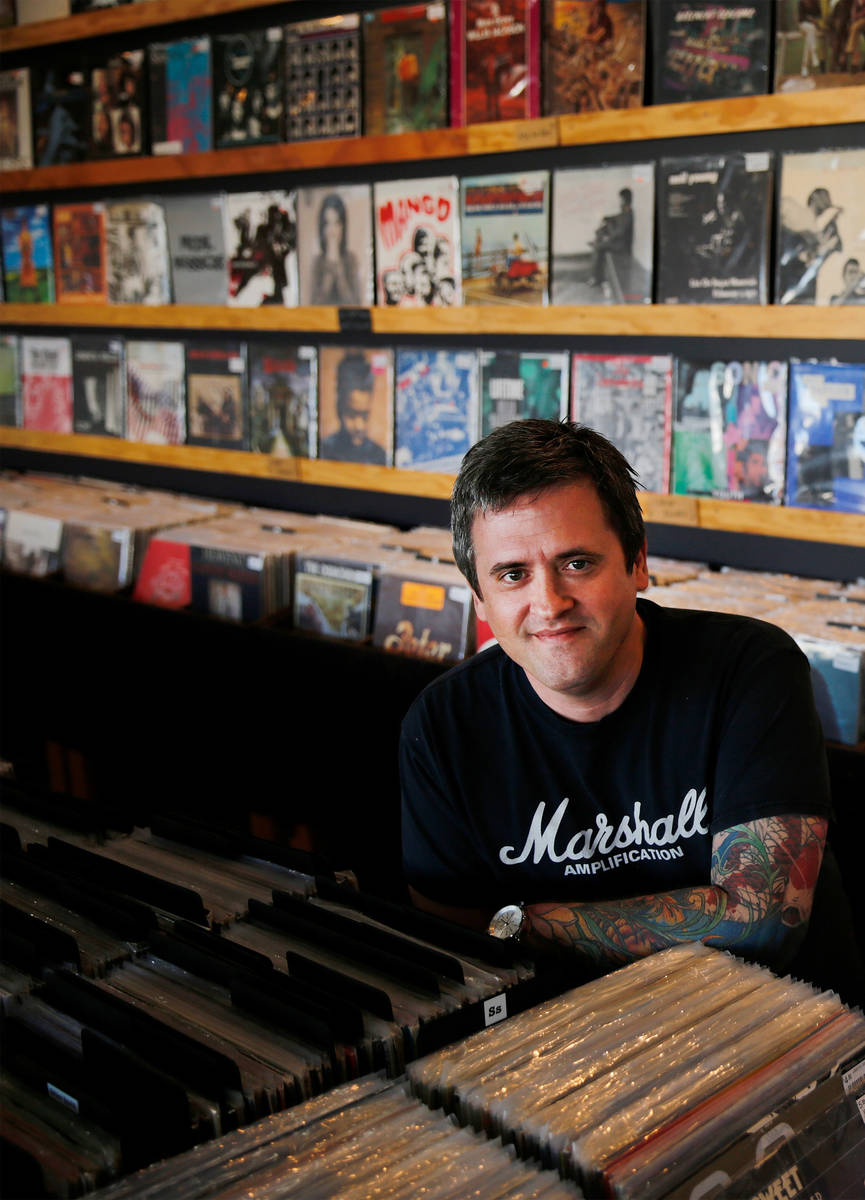 Ronald Corso, owner of 11th Street Records poses for a photo at his record store in Las Vegas, ...