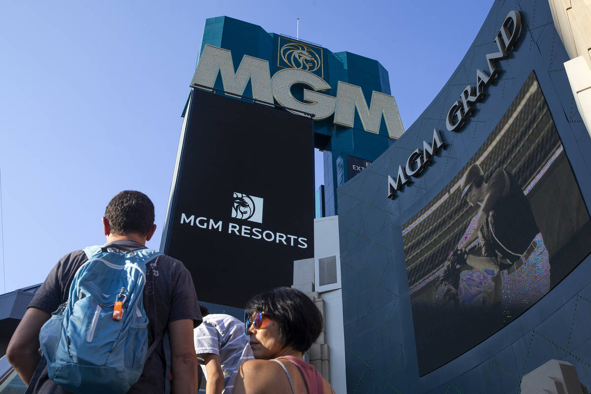 Visitors to the Las Vegas Strip pass MGM Grand on Wednesday, Aug. 4, 2021. (Ellen Schmidt/Las V ...