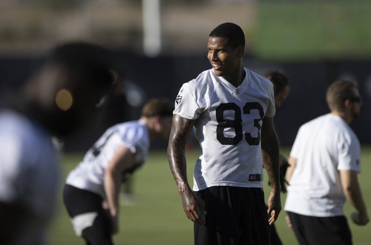 Raiders tight end Darren Waller (83) stretches during training camp on Saturday, July 31, 2021, ...