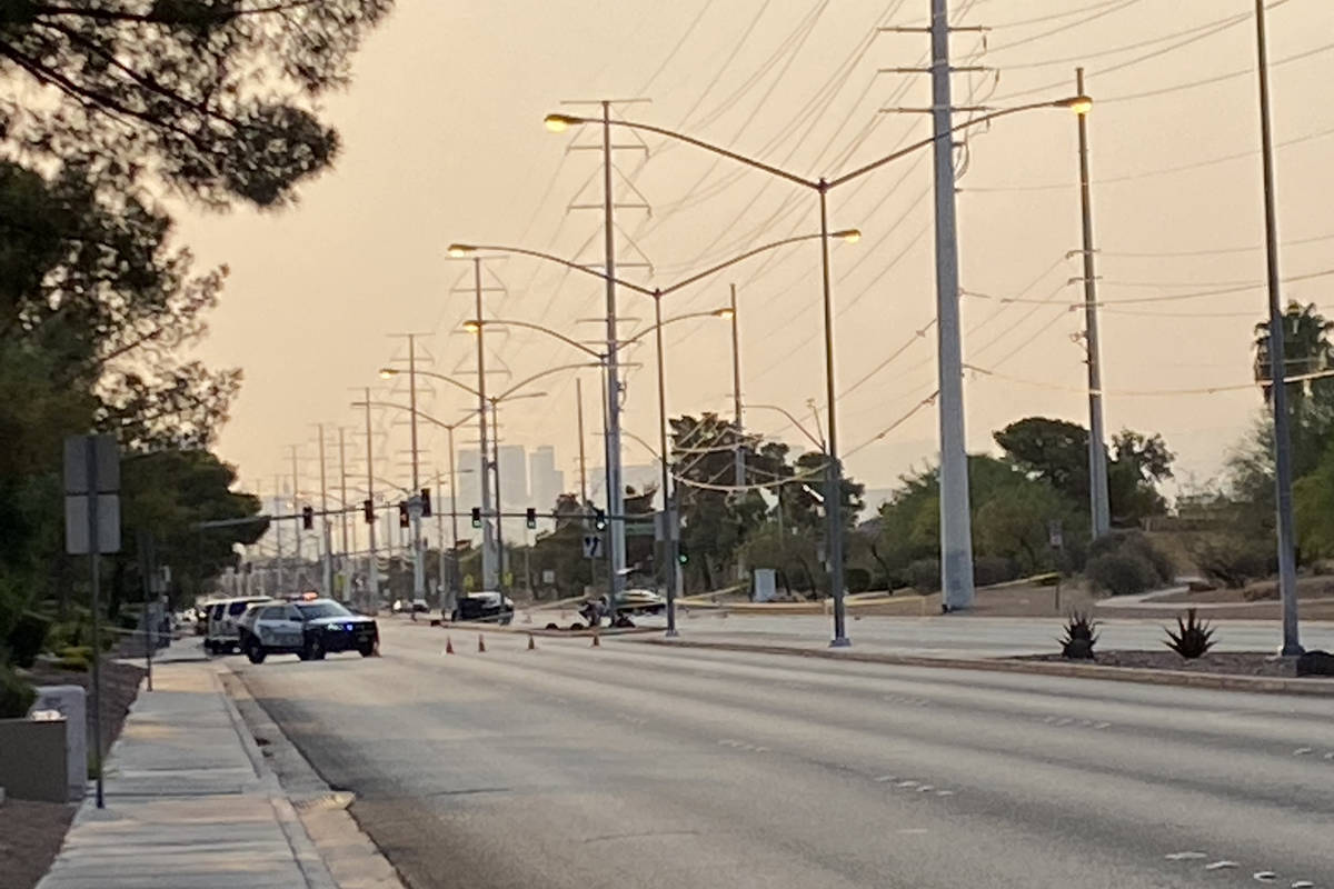 Las Vegas police investigate a fatal accident on Flamingo Road near Tenaya Way on Tuesday, Aug. ...