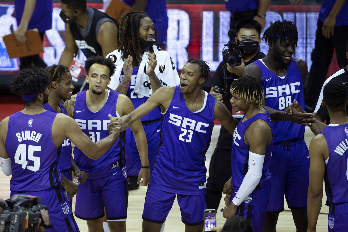 The Sacramento Kings, including forward Louis King (23) celebrate a win against the Boston Celt ...