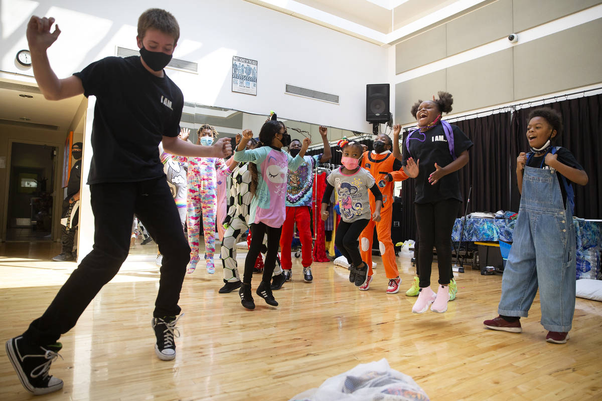 Koston Pabon left, dances alongside other cast members during a rehearsal for Broadway in the H ...