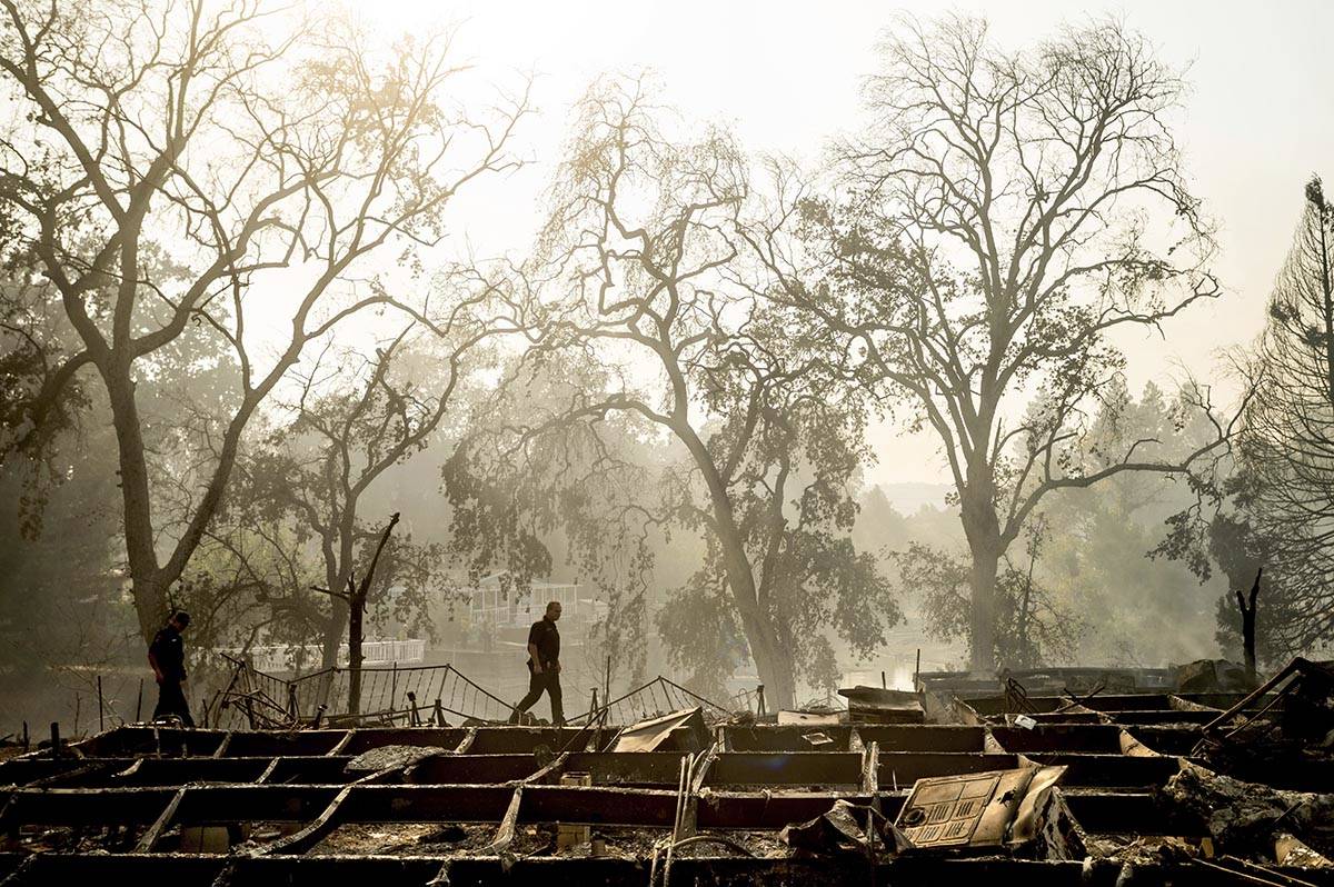 Detective Steve Hobb searches for possible victims at Cache Creek Mobile Home Estates where the ...