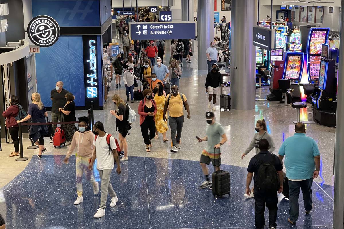 McCarran International Airport had 4.15 million travelers passing through its gates in July. (K ...