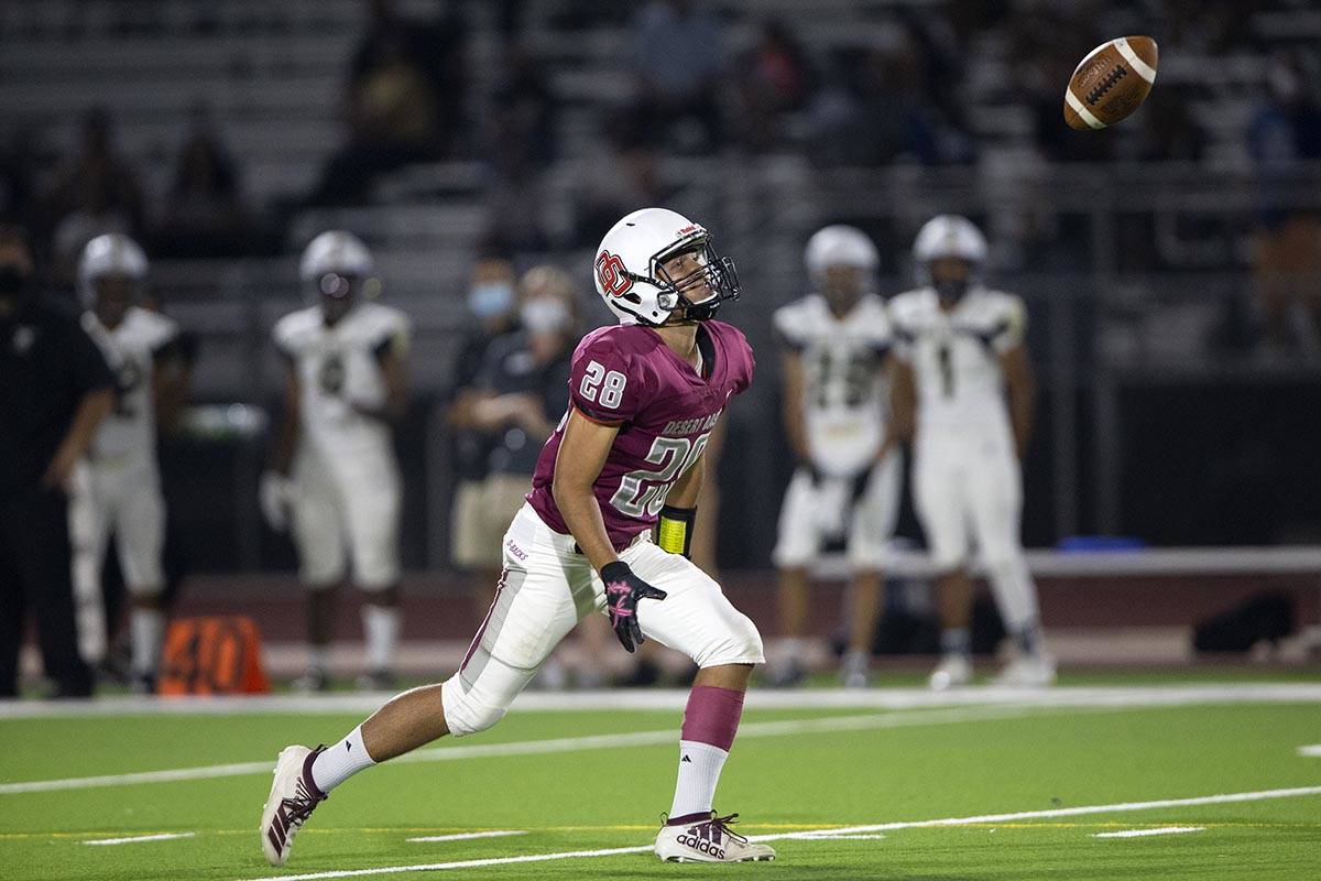 Desert Oasis wide receiver Xzavery Simi (28) runs to catch during a high school football game a ...