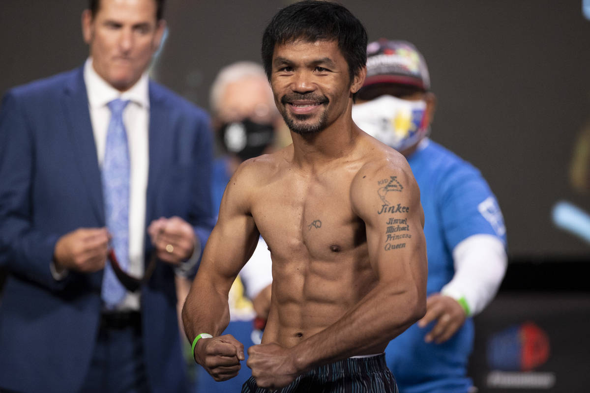 Manny Pacquiao poses for a portrait during a weigh-in event at the MGM Grand Garden Arena in La ...