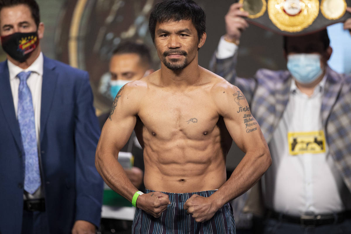 Manny Pacquiao poses for a portrait during a weigh-in event at the MGM Grand Garden Arena in La ...