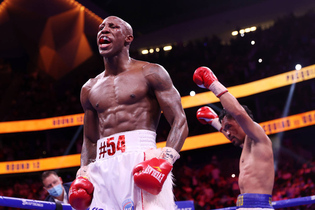 Yordenis Ugas reacts at the end of his fight against Manny Pacquiao in the WBA World Welterweig ...