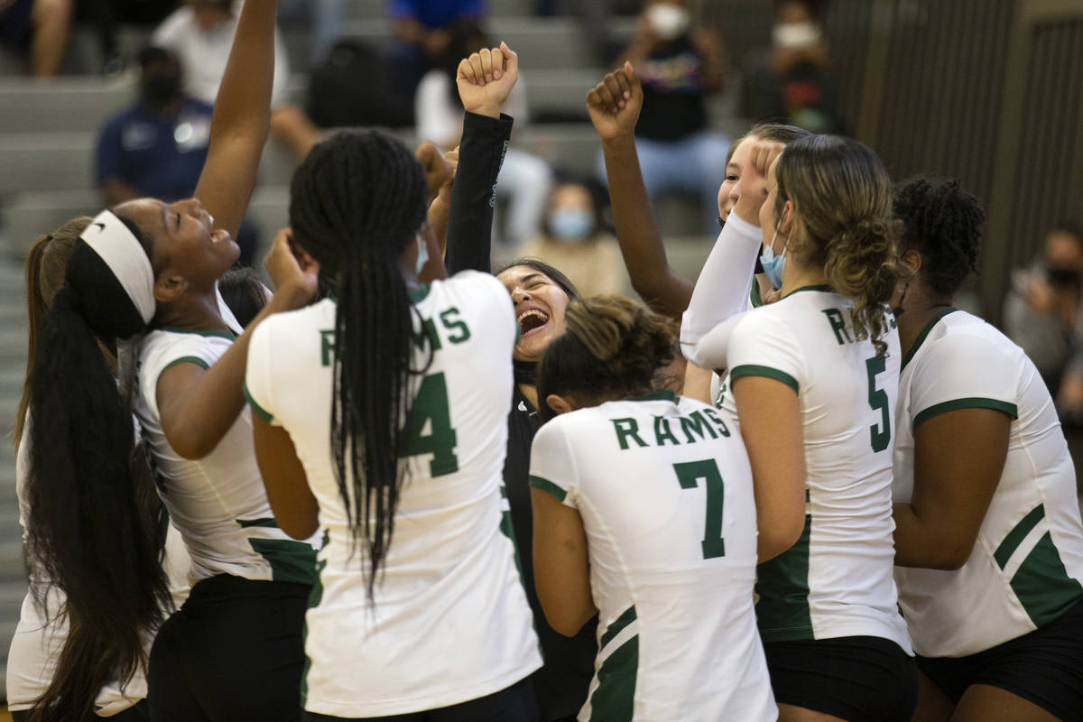 Rancho girls varsity volleyball cheers after winning the first match against Western High Schoo ...