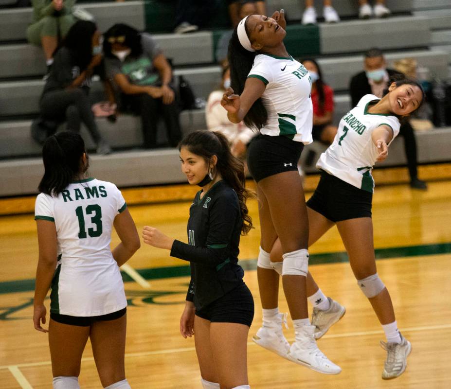 Rancho's Leah Miller (10) and Jan Marie Duhaylungsod (7) celebrate an ace earned by Duhaylungso ...