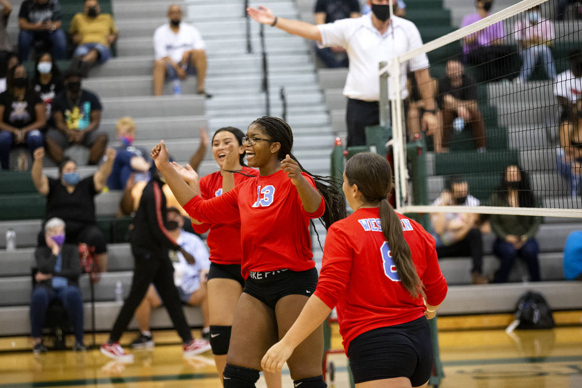 From left, Western High School's Ashley Hipolito (11), Jennifer Merriweather (13) and Mia Perez ...