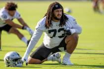 Raiders offensive tackle Devery Hamilton (73) stretches during the teamÕs NFL football pra ...