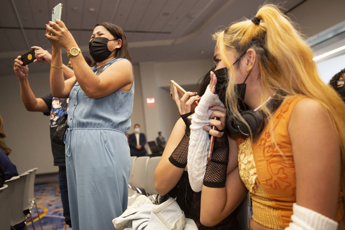 Family members of Loreta Mercado, who won $250,000 during the final Vax Nevada Days winner anno ...