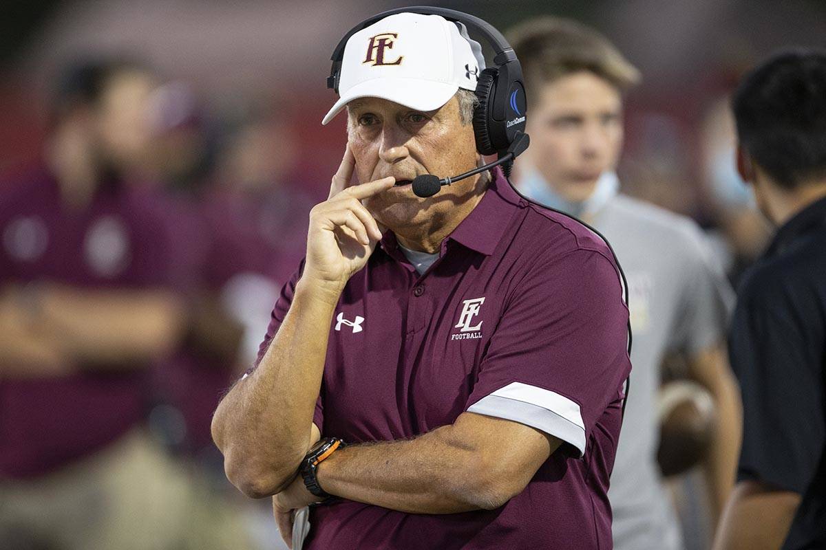 Faith Lutheran's head coach Mike Sandford watches his team play Arbor View during the first hal ...