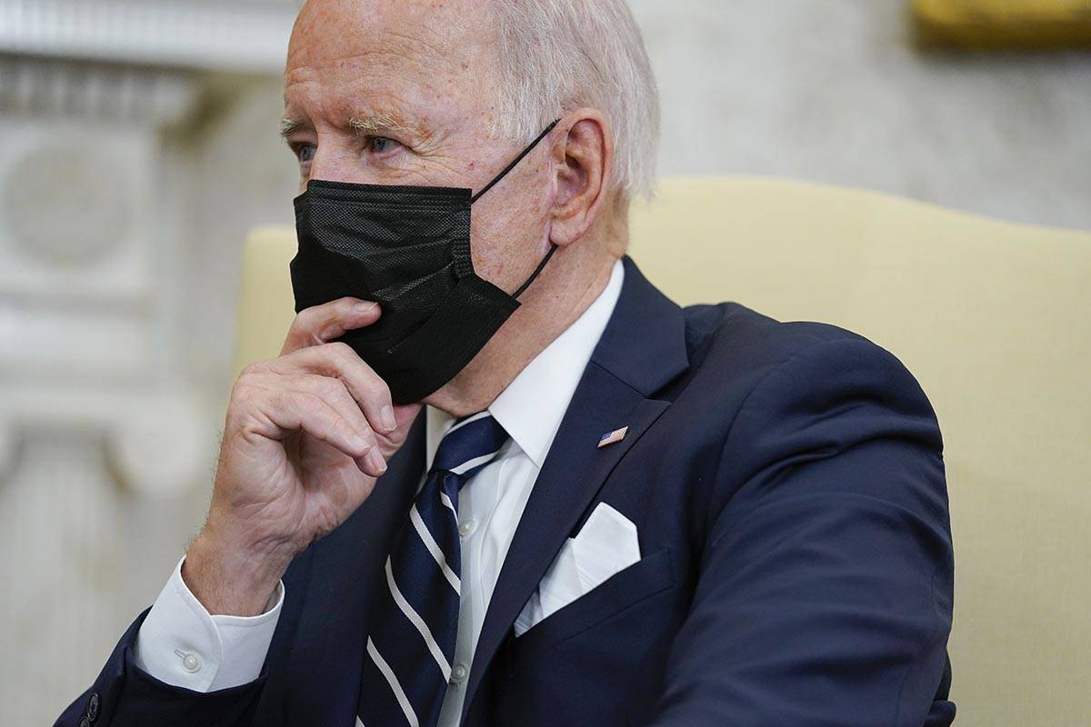 President Joe Biden listens as he meets with Israeli Prime Minister Naftali Bennett in the Oval ...