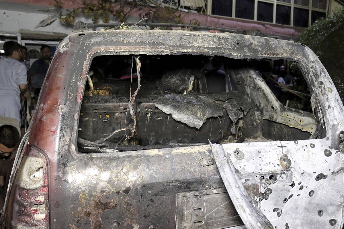 Alleged suicide bombers' car hit by drone, Kabul airport. (AP, STN)
