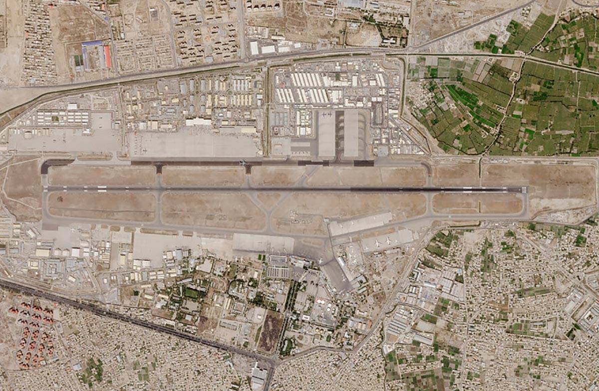 In this satellite photo taken by Planet Labs Inc., Kabul's international airport is seen Saturd ...