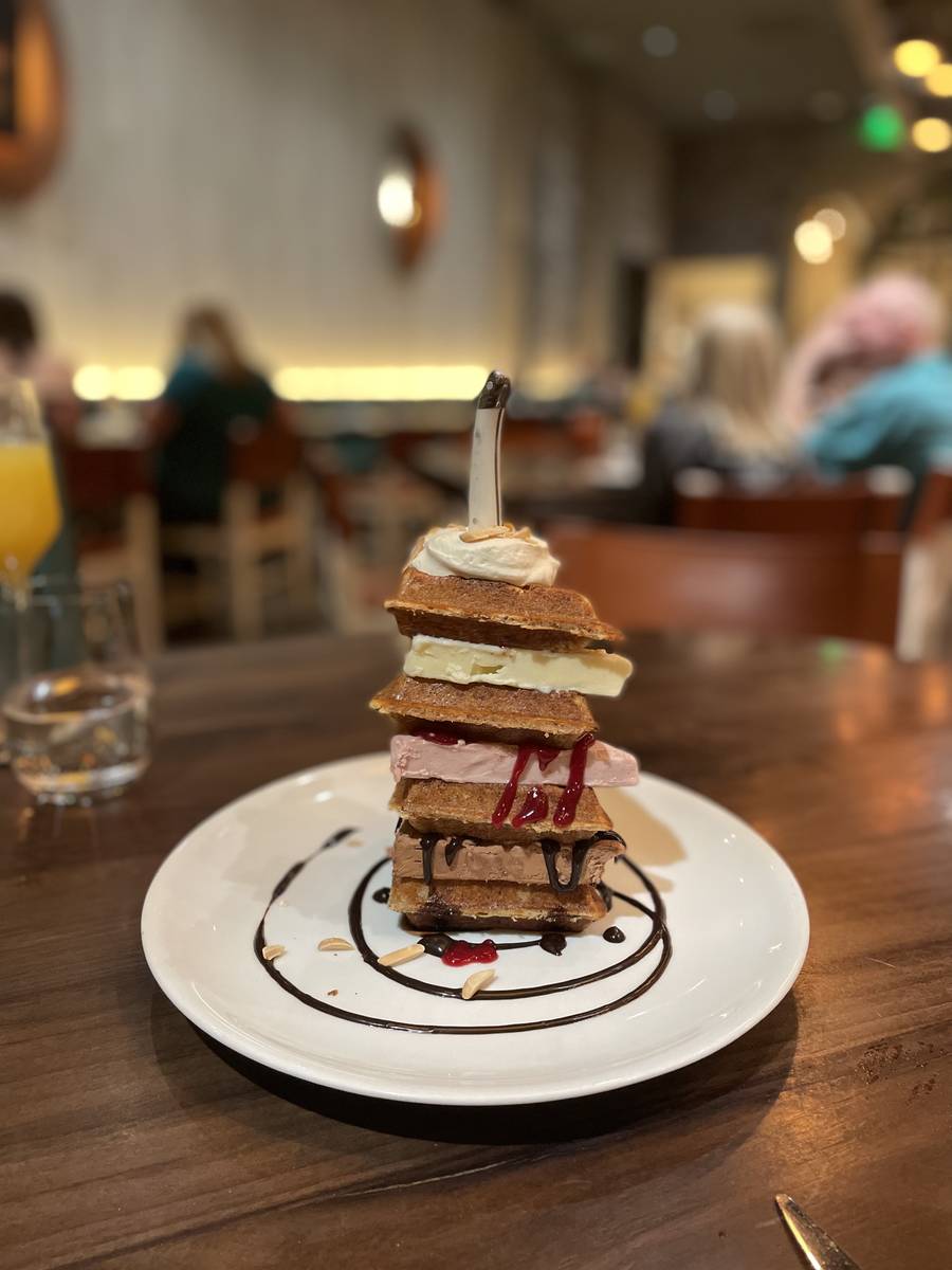 The Anytime Waffle Tower created with maple, milk chocolate and raspberry ice cream, chocolate ...