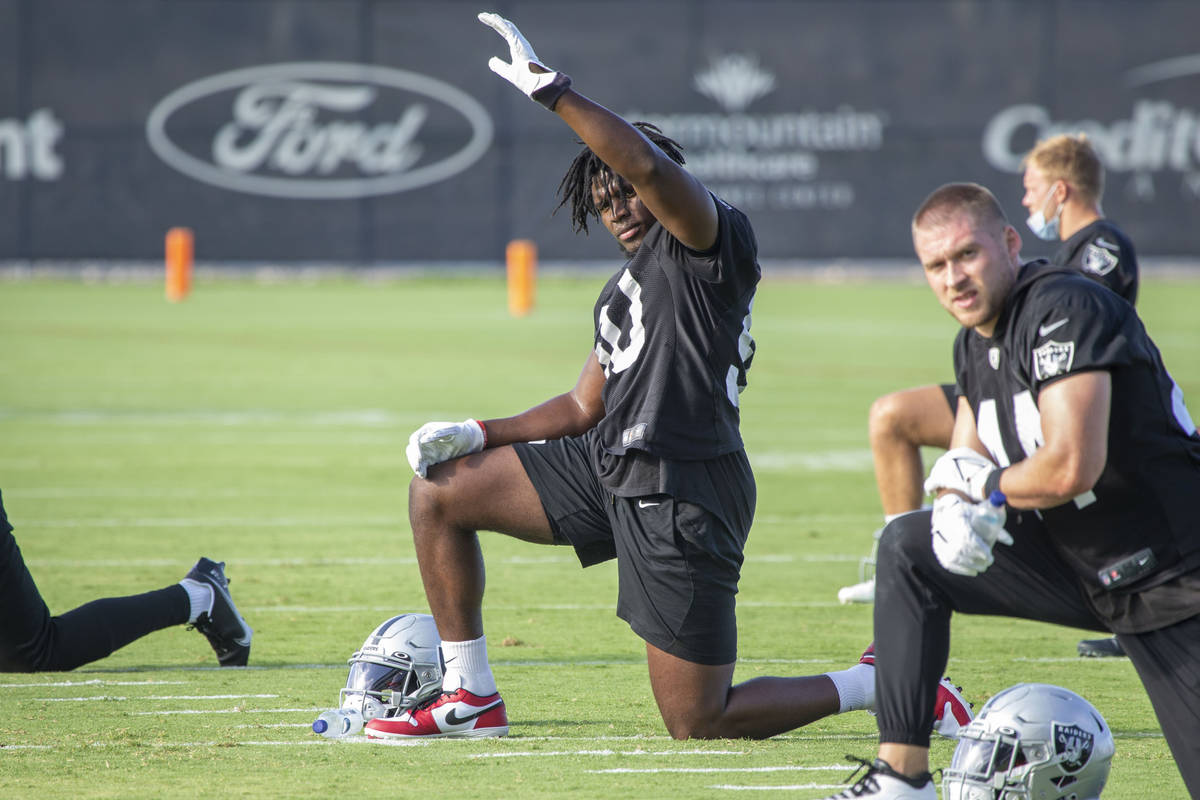 Raiders linebacker Nicholas Morrow (50) stretches during the teamÕs NFL training camp prac ...