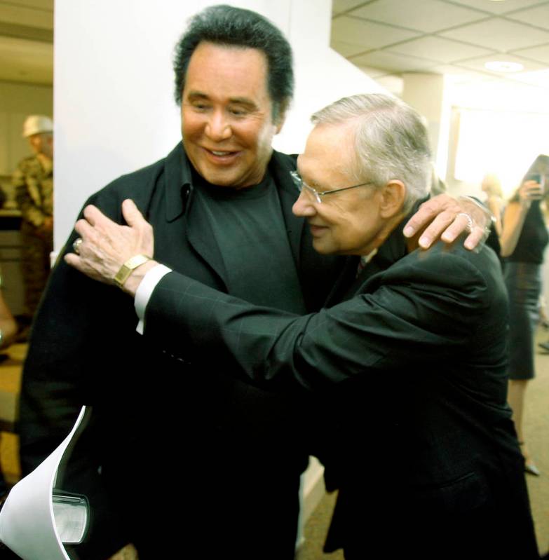 Entertainer Wayne Newton, left, greets U.S. Senator Harry Reid, D-Nev., during a groundbreaking ...