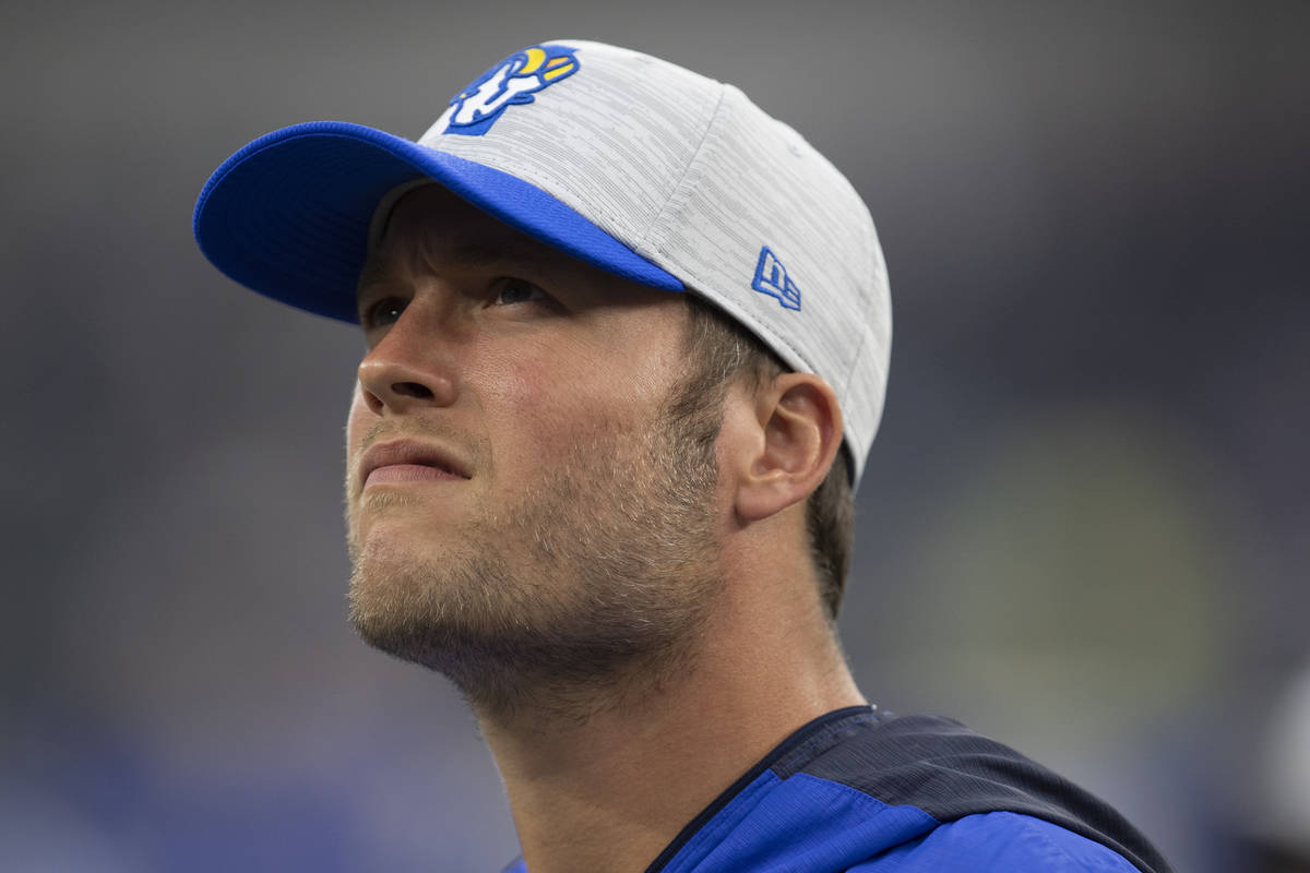 Los Angeles Rams quarterback Matthew Stafford looks over towards the stands before an NFL footb ...