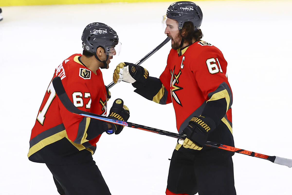 Golden Knights' Mark Stone, right, celebrates his goal with Max Pacioretty during the third per ...