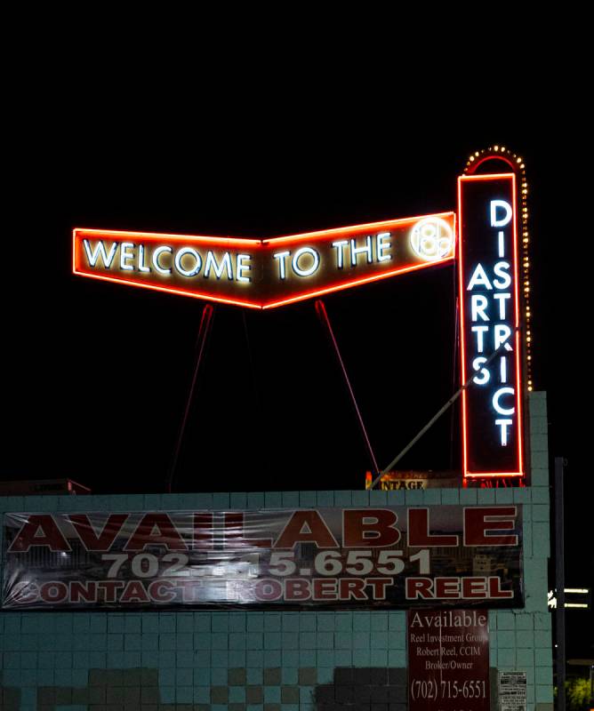 A sign for the Arts District is pictured on Main Street during First Friday in the Arts Distric ...