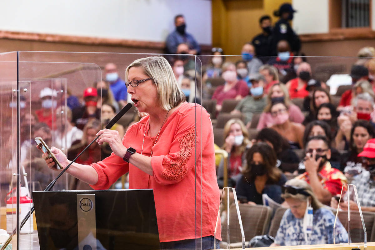 Kathy Stevens, a teacher with the Clark County School District, speaks during public comment at ...