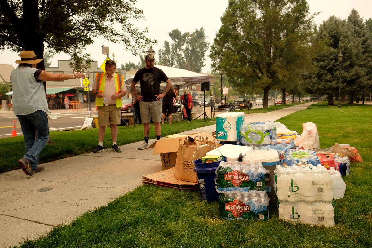 Volunteers in Carson City took in donations of water, blankets and other needs for people displ ...