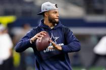 Dallas Cowboys quarterback Dak Prescott participates in warm ups before an NFL preseason footba ...