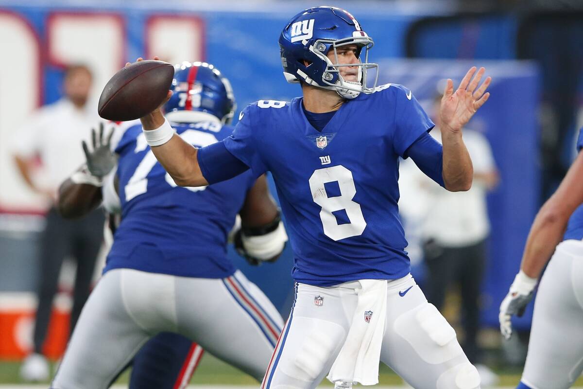 New York Giants quarterback Daniel Jones (8) throws a pass during the first half of an NFL pres ...